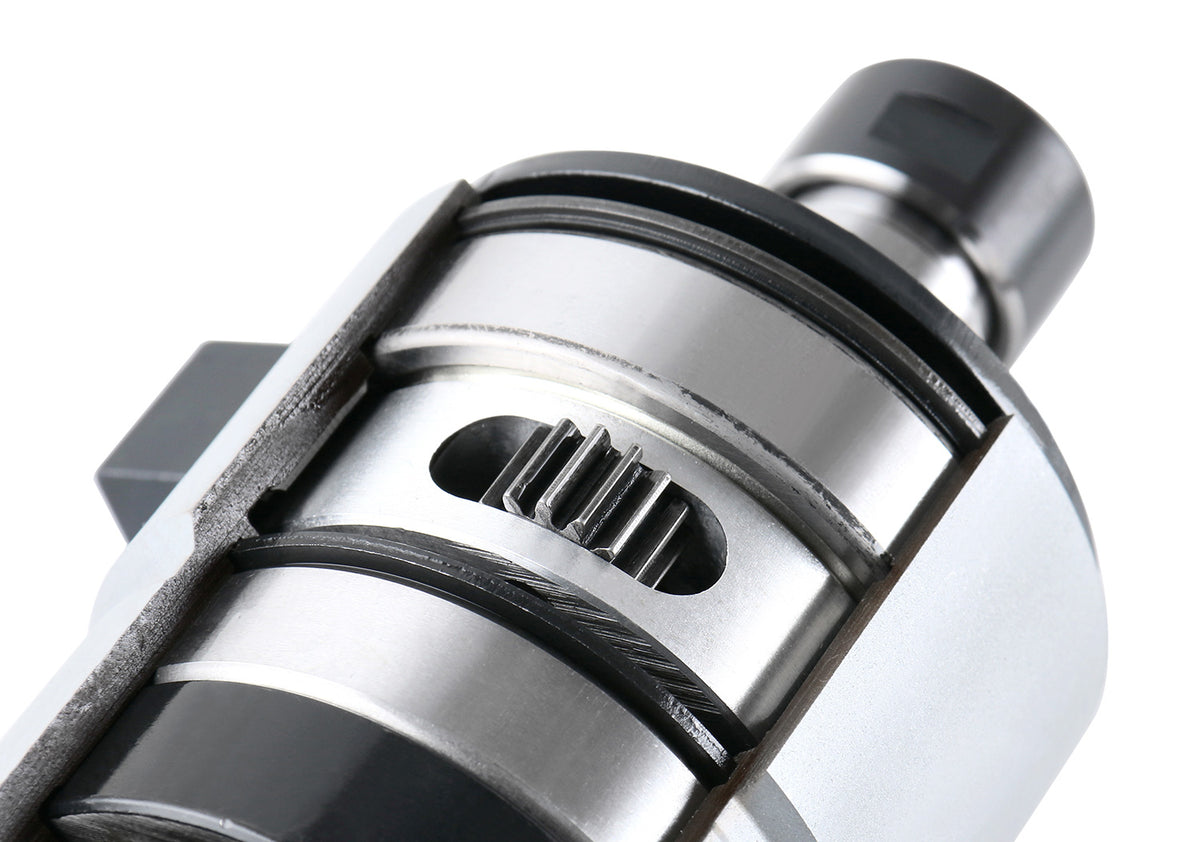 Self-Reversing Tapping Heads
